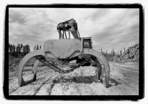 Industrial machinery used on Grassy Narrows land, Ontario. Photographer: Jon Schledewitz.